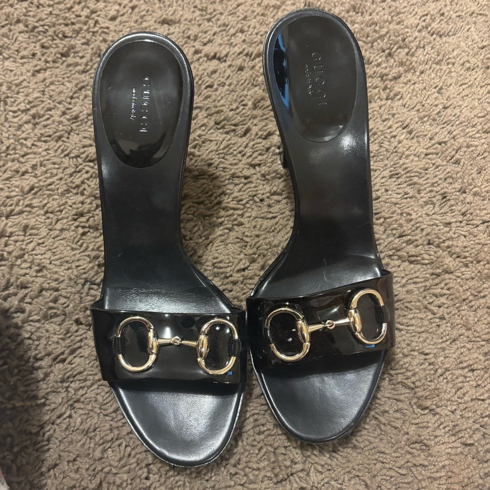 Gucci Black Mules with Gold Detailing